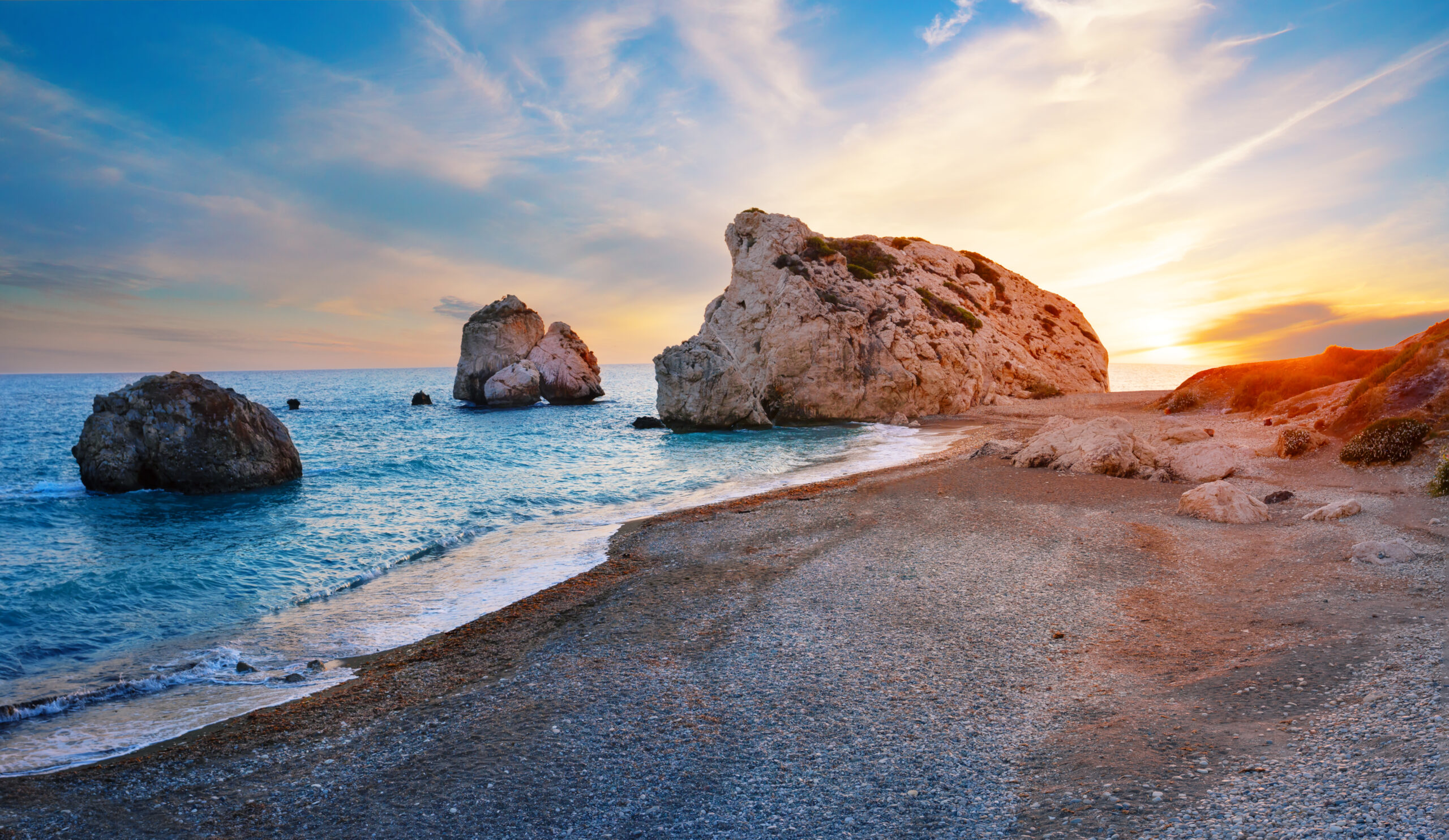 Aphrodite’s Beach in Cyprus at sunset symbolising the appeal of relocating to Cyprus for EU residents